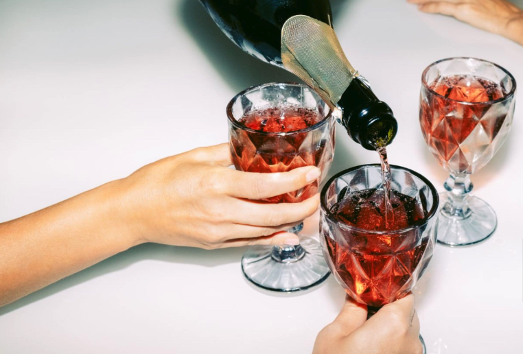 Partygoers wait for refills